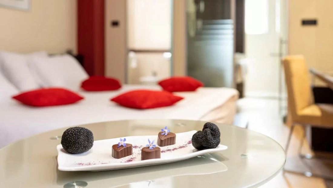 Guest room at Zigante Rooms in Livade with truffle welcome plate